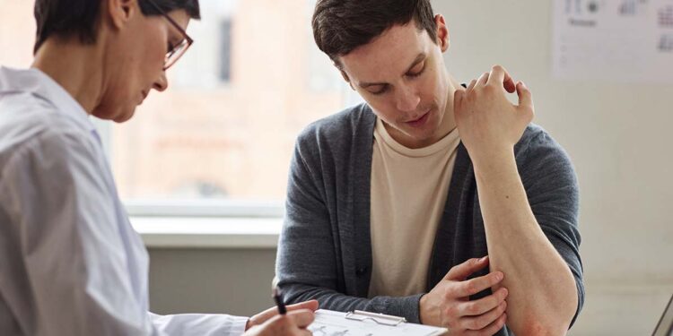 De Griekse reis van een patiënt met artritis psoriatica en axiale spondylartritis