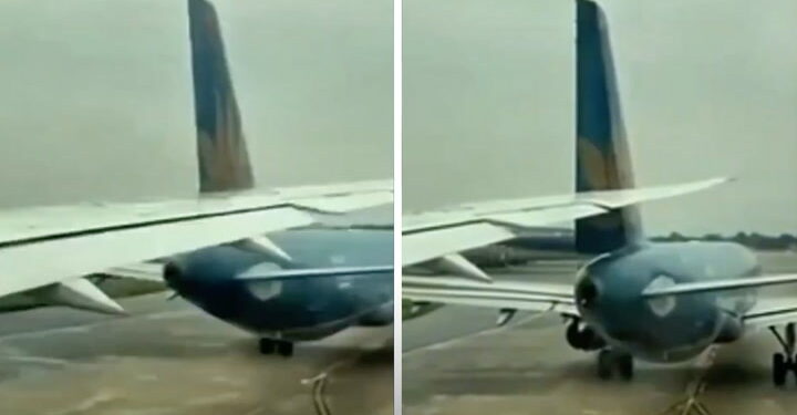 Boeing vliegtuig raakt staart van ander vliegtuig op groot vliegveld.