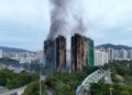 Hong Kong: Dodental bij brand in wolkenkrabbers stijgt naar 128, tientallen vermisten