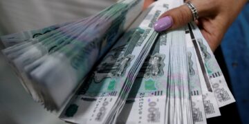 Impact van Amerikaanse sancties op Russische oliemaatschappijen en de roebel